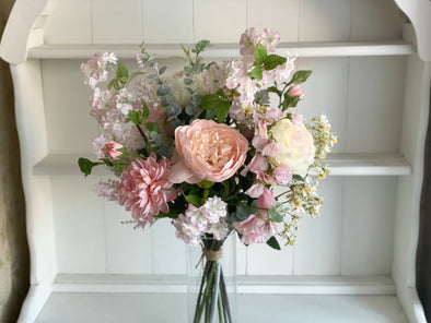 Pink and cream faux flower arrangement *Vase not included
