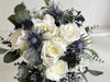 White and navy blue artificial wedding flowers.