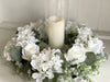 White roses and hydrangea with eucalyptus. Artificial flower wreath.