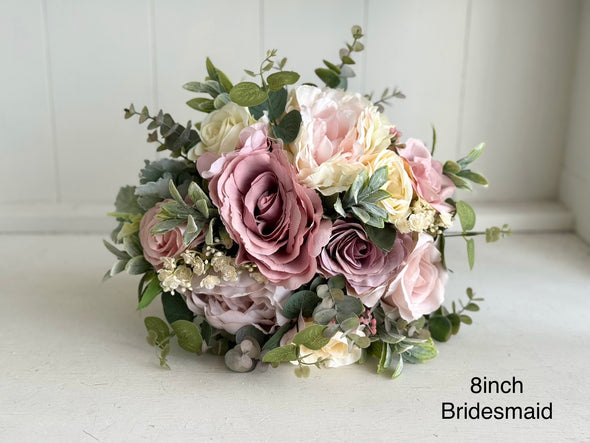 Dusky pink and cream artificial wedding flowers. Roses and peonies.