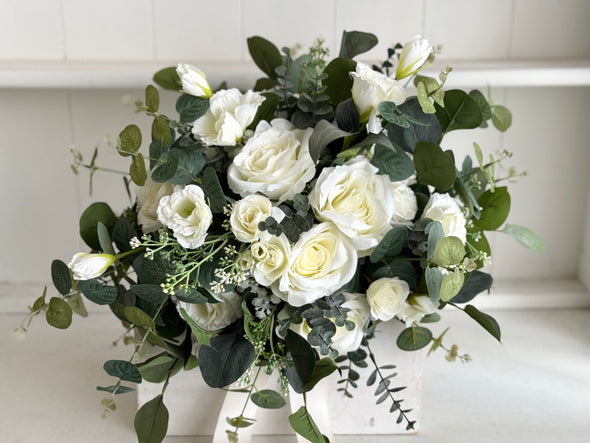 Rustic white and green wedding flowers with eucalyptus greenery.