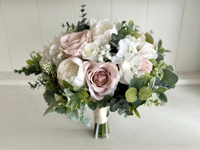 Blush pink and white artificial wedding flowers. Roses and peonies.