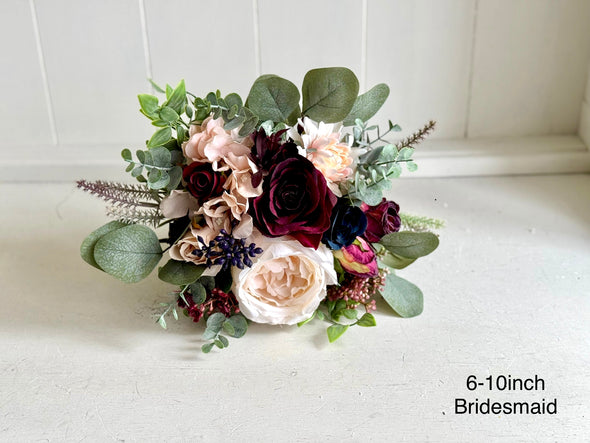 Champagne, nude blush, burgundy and navy blue wedding flowers