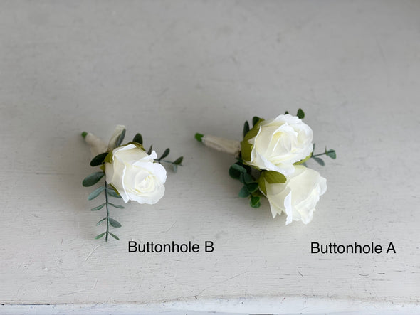 Romantic ivory white wedding flowers with eucalyptus greenery.