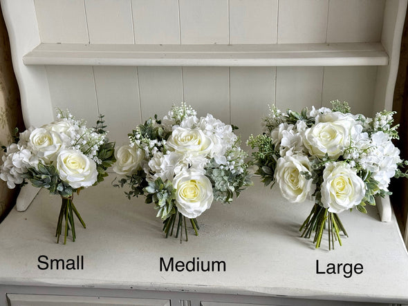 Elegant white and sage green hand tied silk flower arrangement. Table centrepiece. *Vase not included