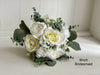 White and sage green artificial wedding flowers. Roses, peonies and gypsophila.