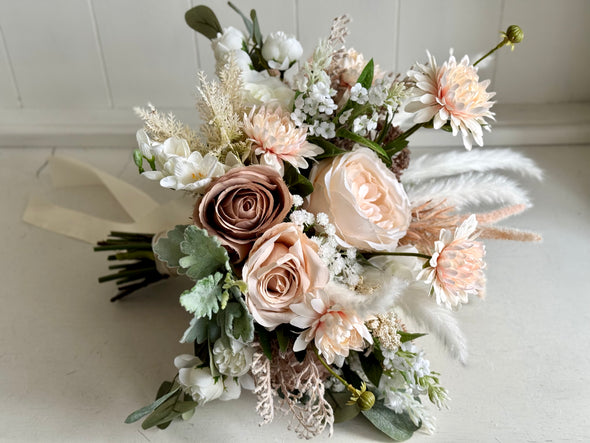 Rustic boho ivory, nude blush and mocha wedding flowers.