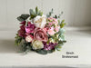 Pink and cream artificial wedding flowers. Roses and peonies.