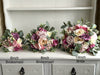 Pink and cream artificial wedding flowers. Roses and peonies.