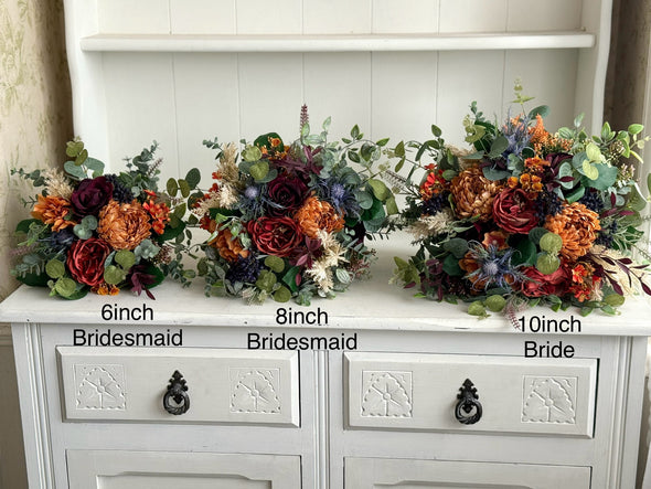 Rustic burnt orange, burgundy and navy blue wedding flowers.