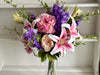 Pink and purple faux flower arrangement *Vase not included