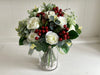 Christmas faux flower tied arrangement. Roses, berries and mixed foliage. *Vase not included