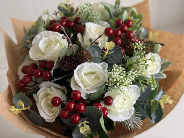 Christmas faux flower tied arrangement. Roses, berries and mixed foliage. *Vase not included