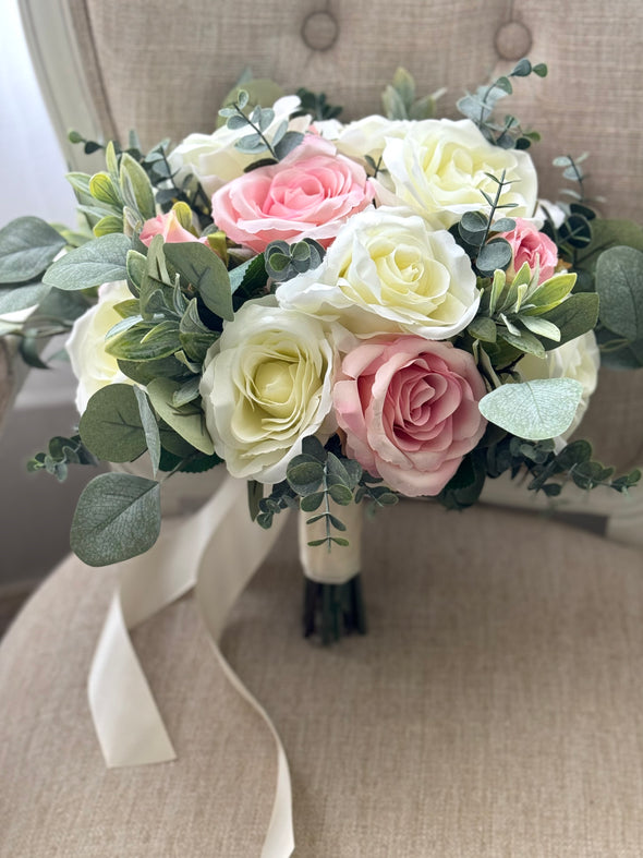 Romantic pink and ivory roses silk wedding flowers with eucalyptus and sage greenery. Pink and ivory artificial wedding bouquet.