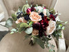 Champagne, nude blush, burgundy and navy blue wedding flowers