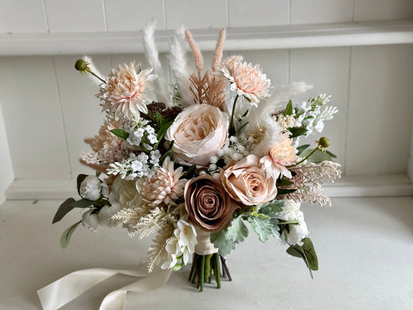 Rustic boho ivory, nude blush and mocha wedding flowers.