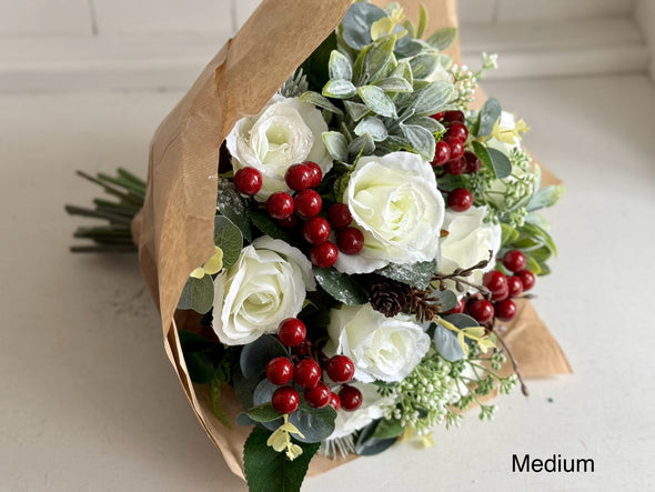 Christmas faux flower tied arrangement. Roses, berries and mixed foliage. *Vase not included