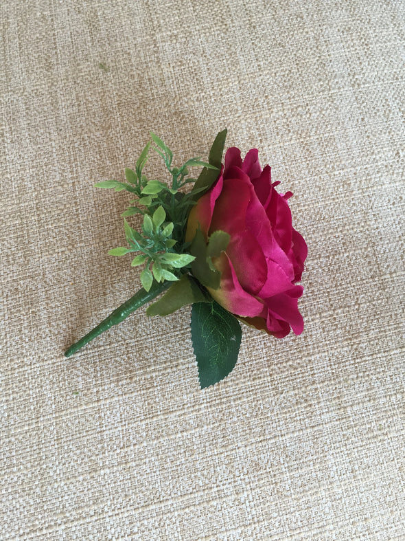 Raspberry pink silk wedding buttonhole / boutonniere.