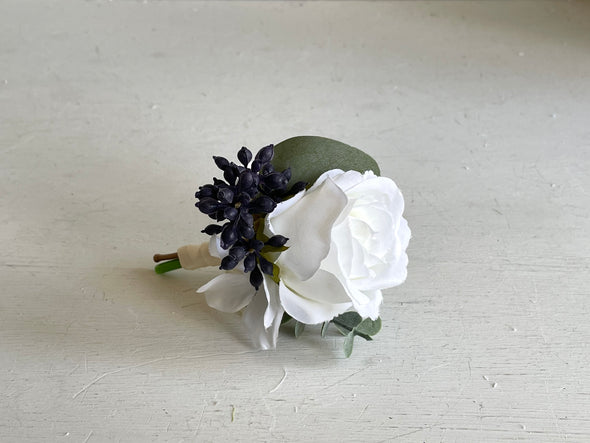 White and navy blue wedding buttonhole