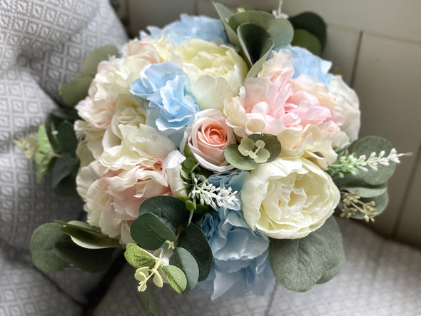 Pale blue, pink and ivory silk wedding bouquet.