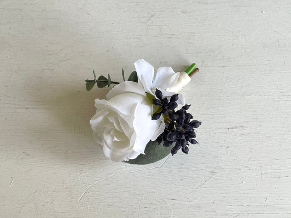 White and navy blue wedding buttonhole