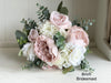 Blush pink and white wedding flowers. Peonies, roses and hydrangea