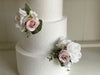 Pink and white artificial wedding flower cake decoration