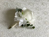 Ivory rose, white hydrangea and eucalyptus wedding buttonhole
